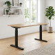 UVI STANDARD V2 electric sit-stand desk with KAINDL Chalet Oak tabletop and black metal frame, front view