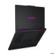 Lenovo Legion Pro 7 16AFR10H gaming laptop with 16-inch OLED display, open lid, dark chassis, front three-quarter view